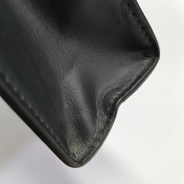Pochette Voyag MM Monogram Coated Canvas Black