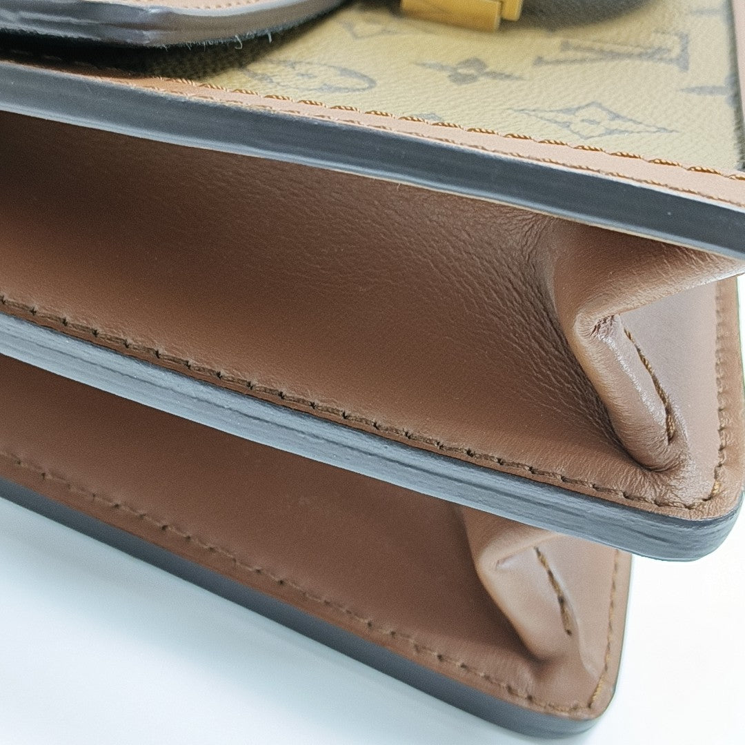 DAUPHINE MM Monogram Coated Canvas Brown