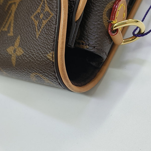 Pochette Camille Monogram Coated Canvas Brown