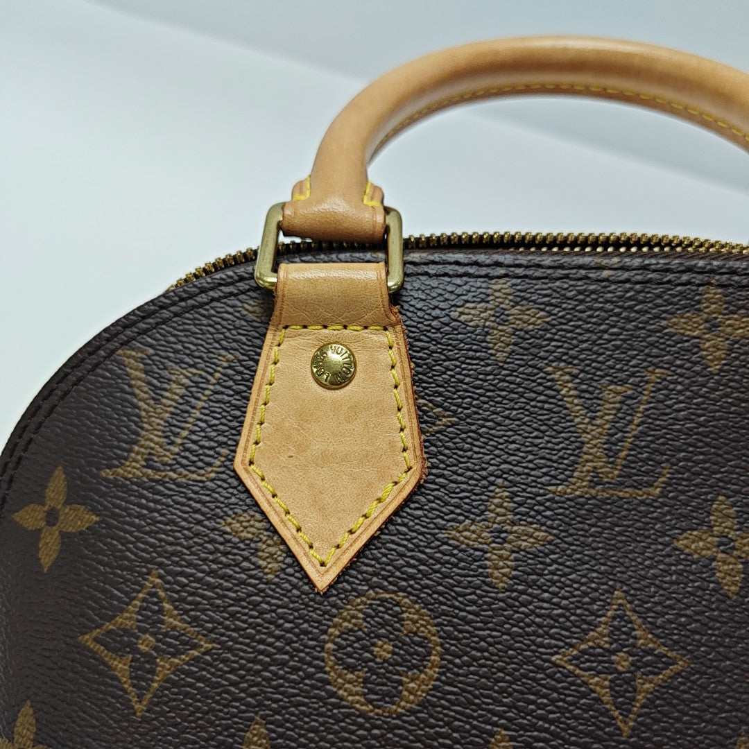 ALMA BB Monogram Coated Canvas Brown