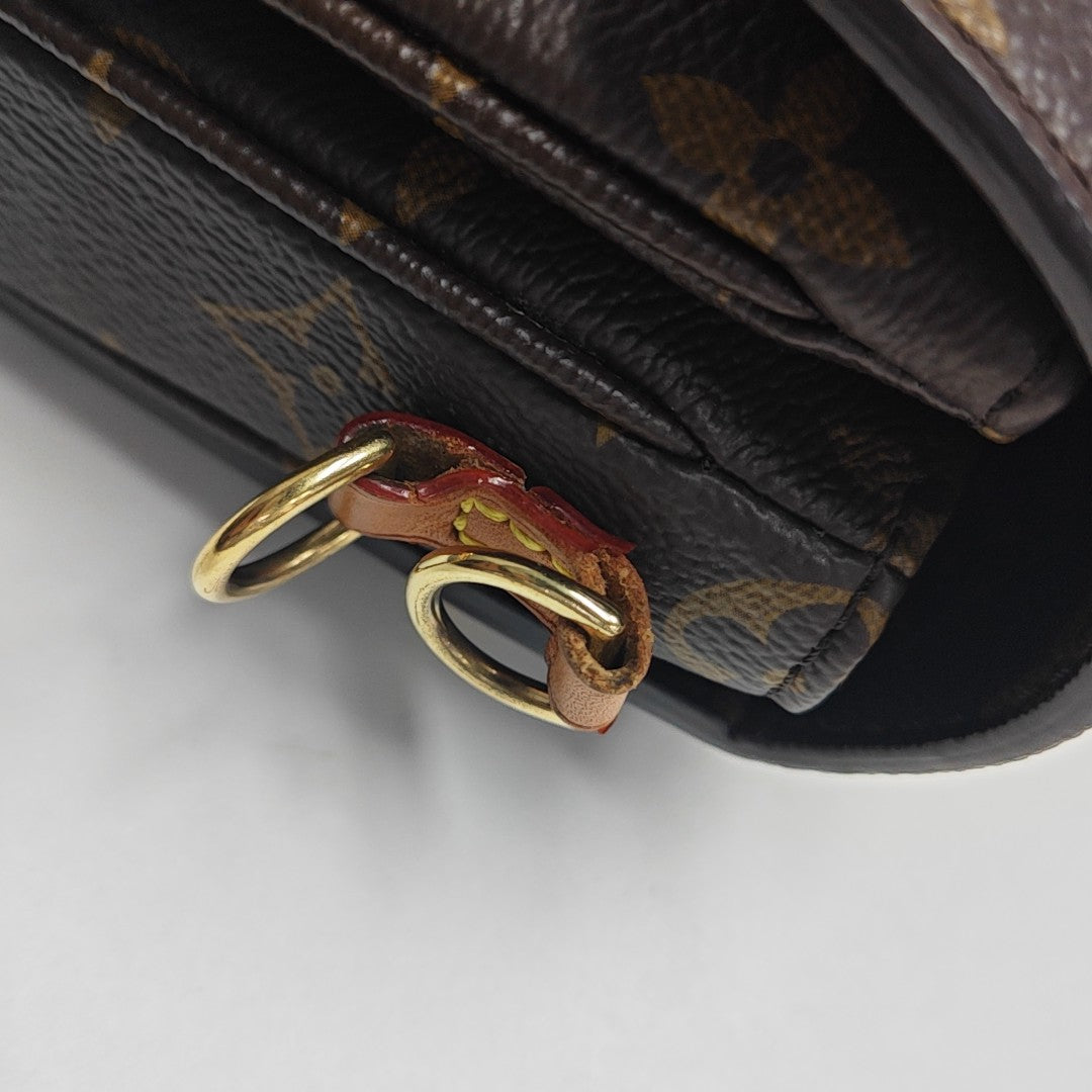 MÉTIS EAST WEST Monogram Coated Canvas Brown