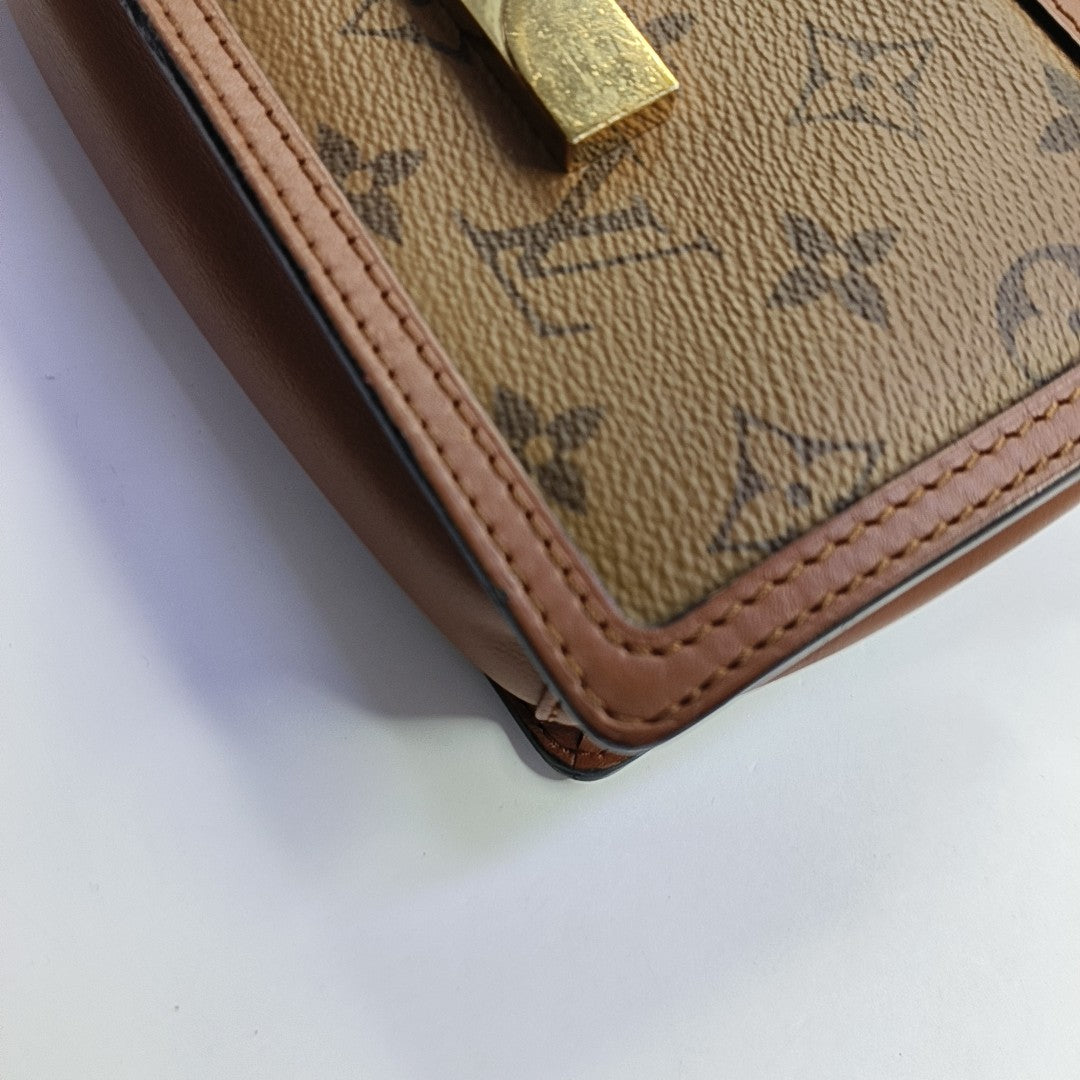 DAUPHINE WOC Monogram Coated Canvas Brown