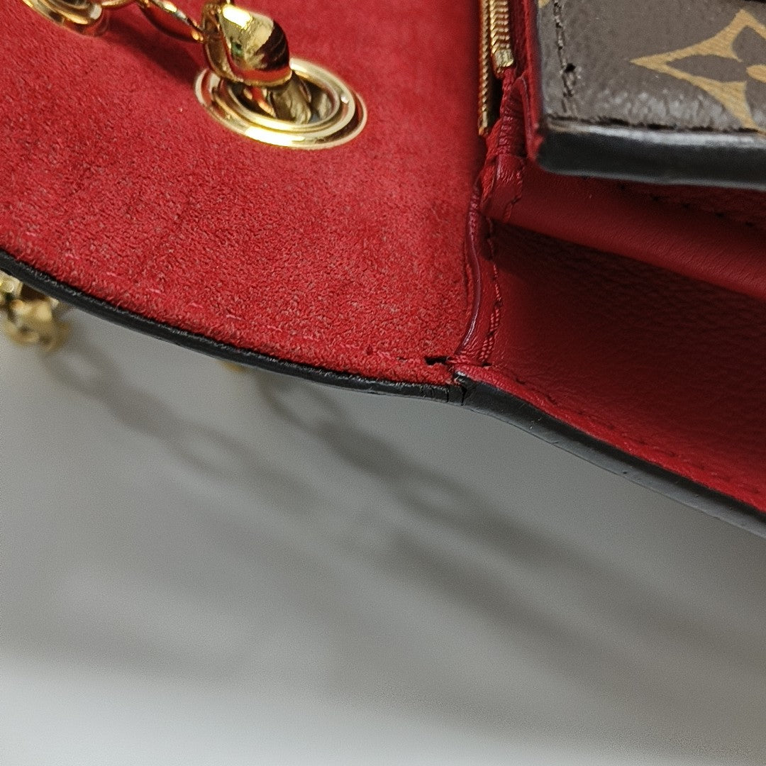 VICTOIRE Monogram Coated Canvas Brown