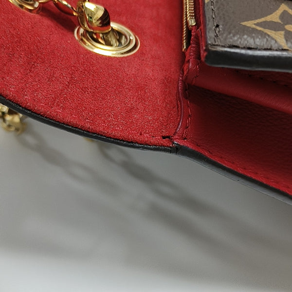 VICTOIRE Monogram Coated Canvas Brown