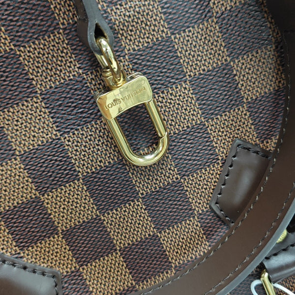 SPEEDY 25 Damier Ebene Coated Canvas Brown