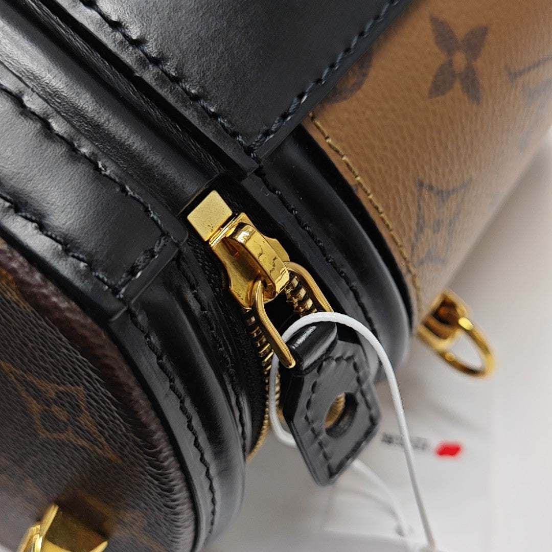 CANNES PM Monogram Coated Canvas Brown