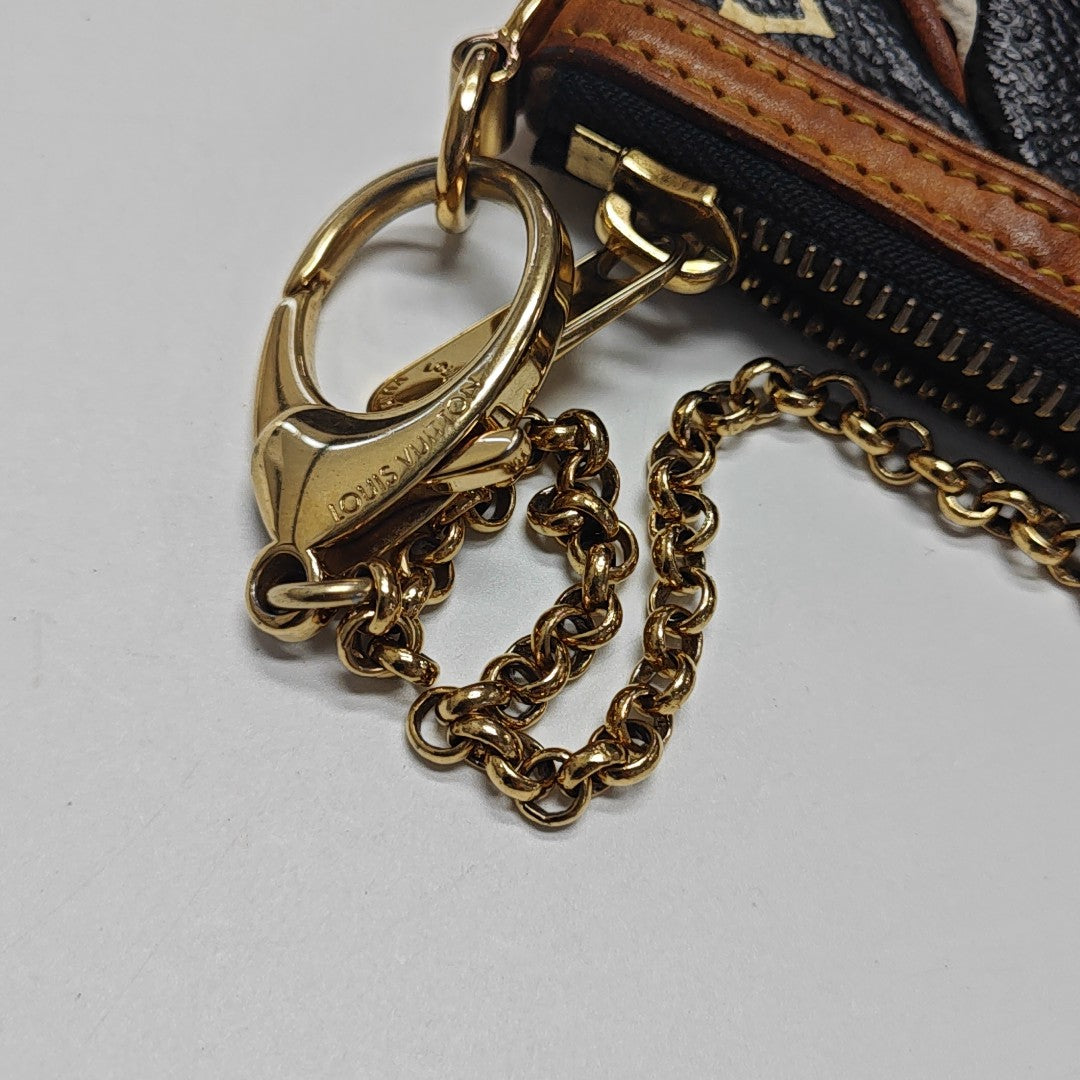 LV × TM VINTAGE MILLA Monogram Coated Canvas Black