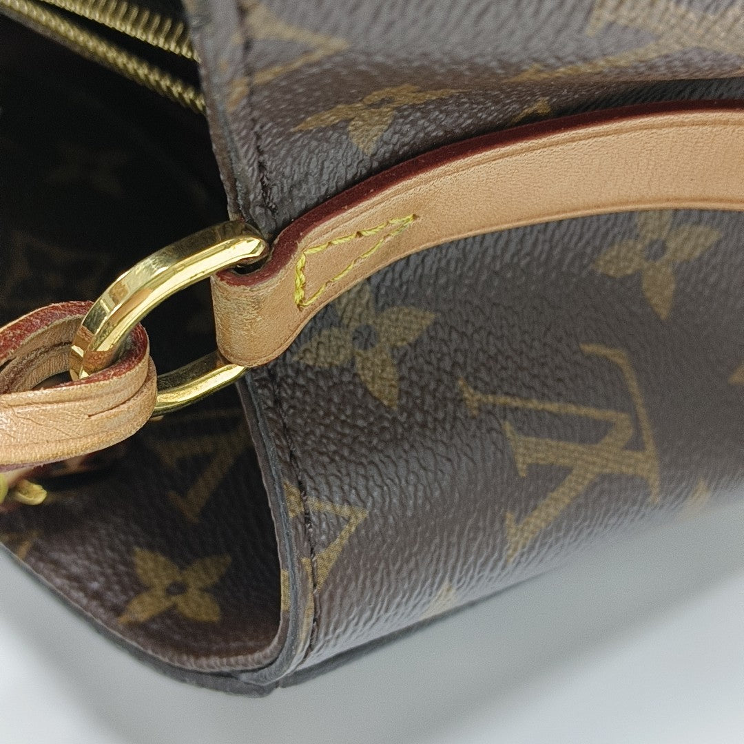 MONTAIGNE GM Monogram Coated Canvas Brown