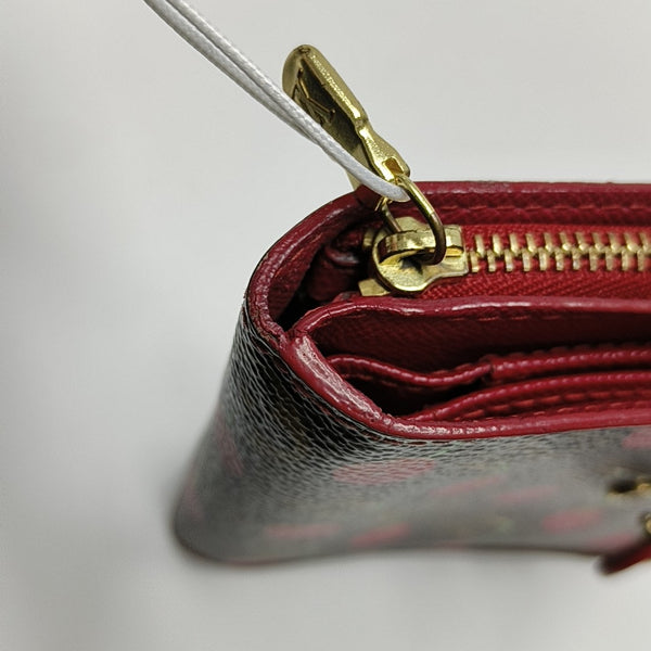 Monogram Coated Canvas Wallet Brown