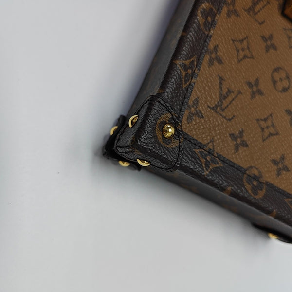 TRUNK Monogram Coated Canvas Brown