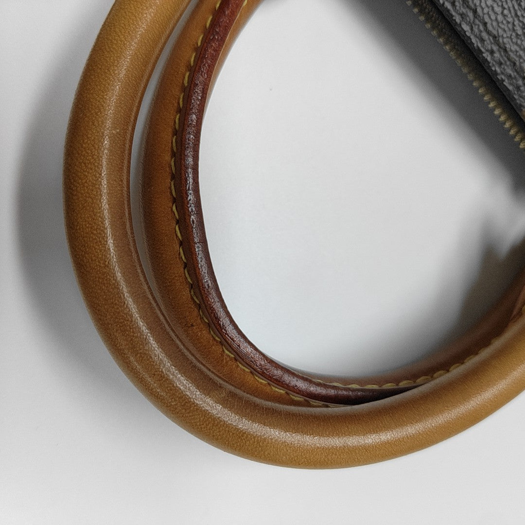 ALMA PM Monogram Coated Canvas Brown