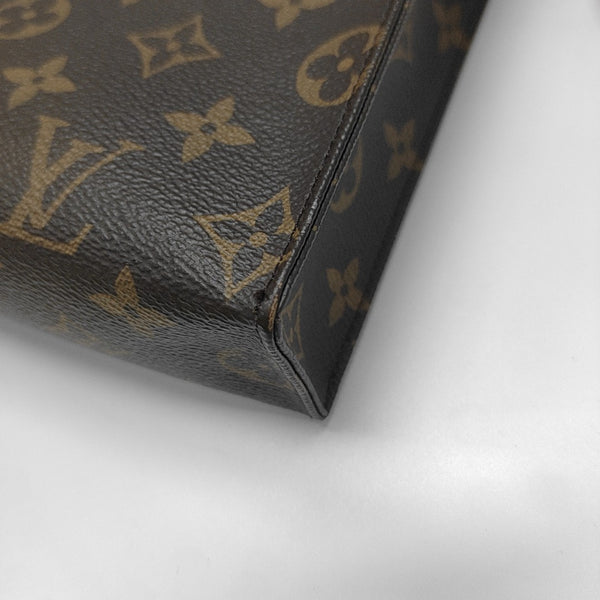 TOILET POCKET 26 Monogram Coated Canvas Brown