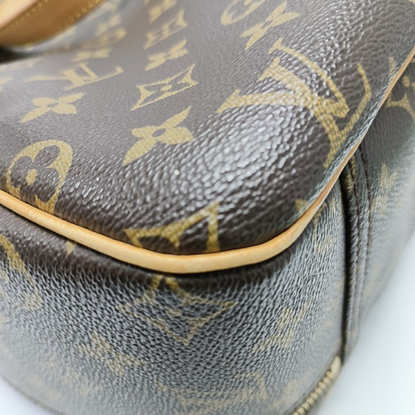 EXCURSION Monogram Coated Canvas Brown