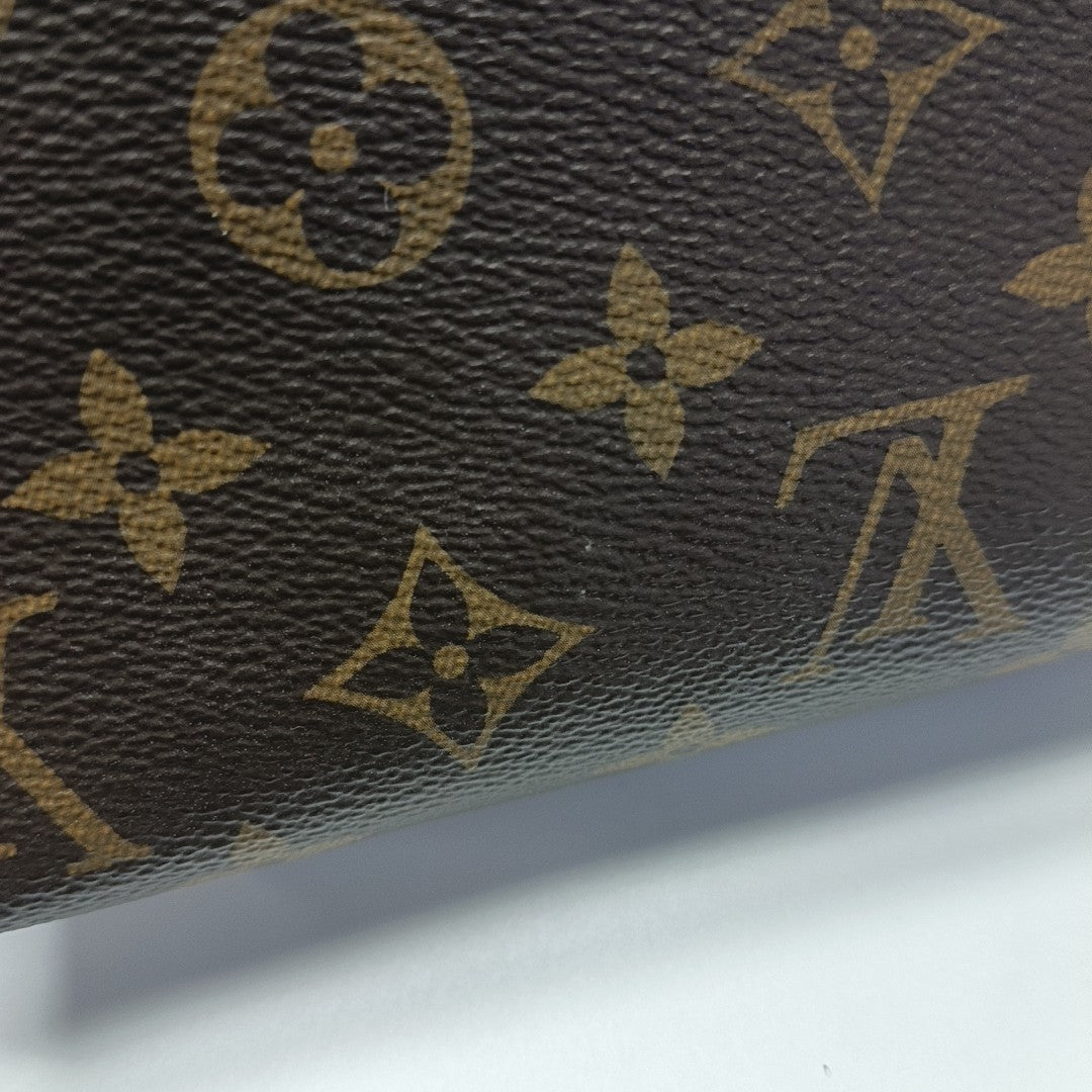 TOILET POCKET 19 Monogram Coated Canvas Brown