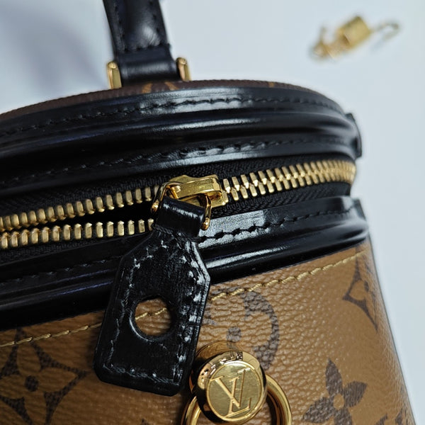 CANNES PM Monogram Coated Canvas Brown