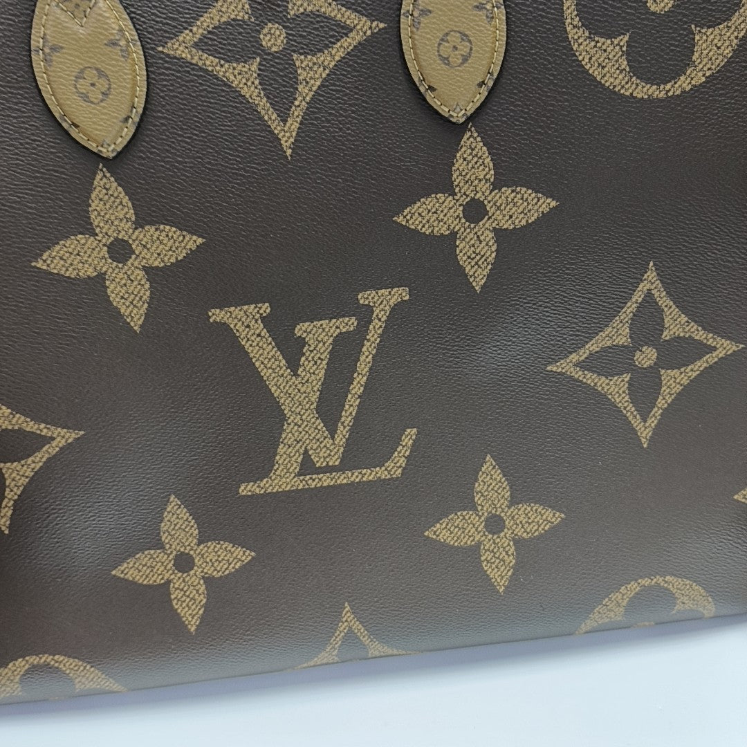 ONTHEGO GM Monogram Coated Canvas Brown