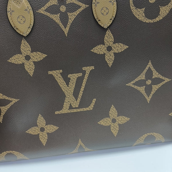 ONTHEGO GM Monogram Coated Canvas Brown