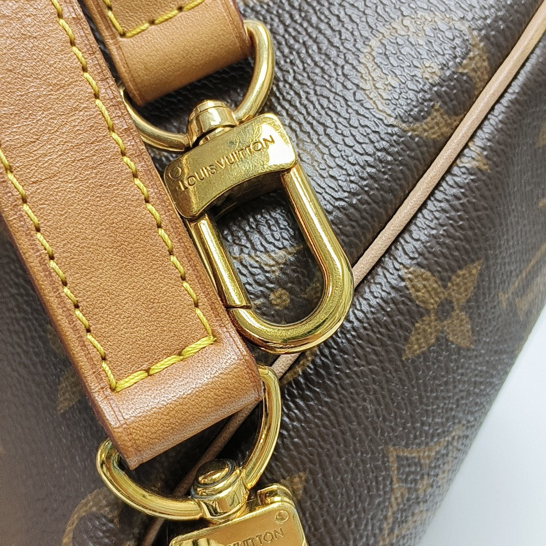 SPEEDY 25 Monogram Coated Canvas Brown
