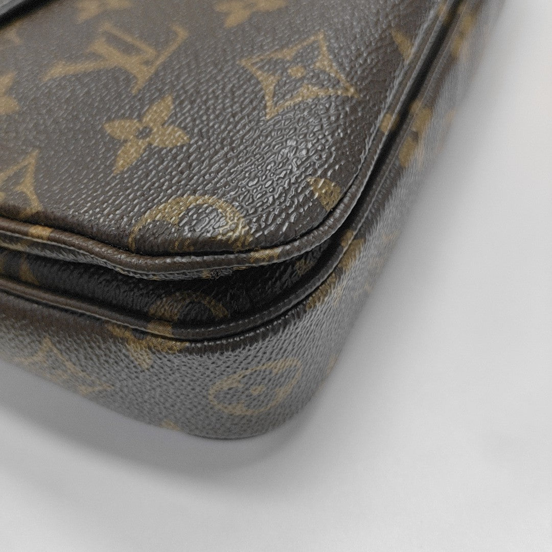 MÉTIS MM Monogram Coated Canvas Brown