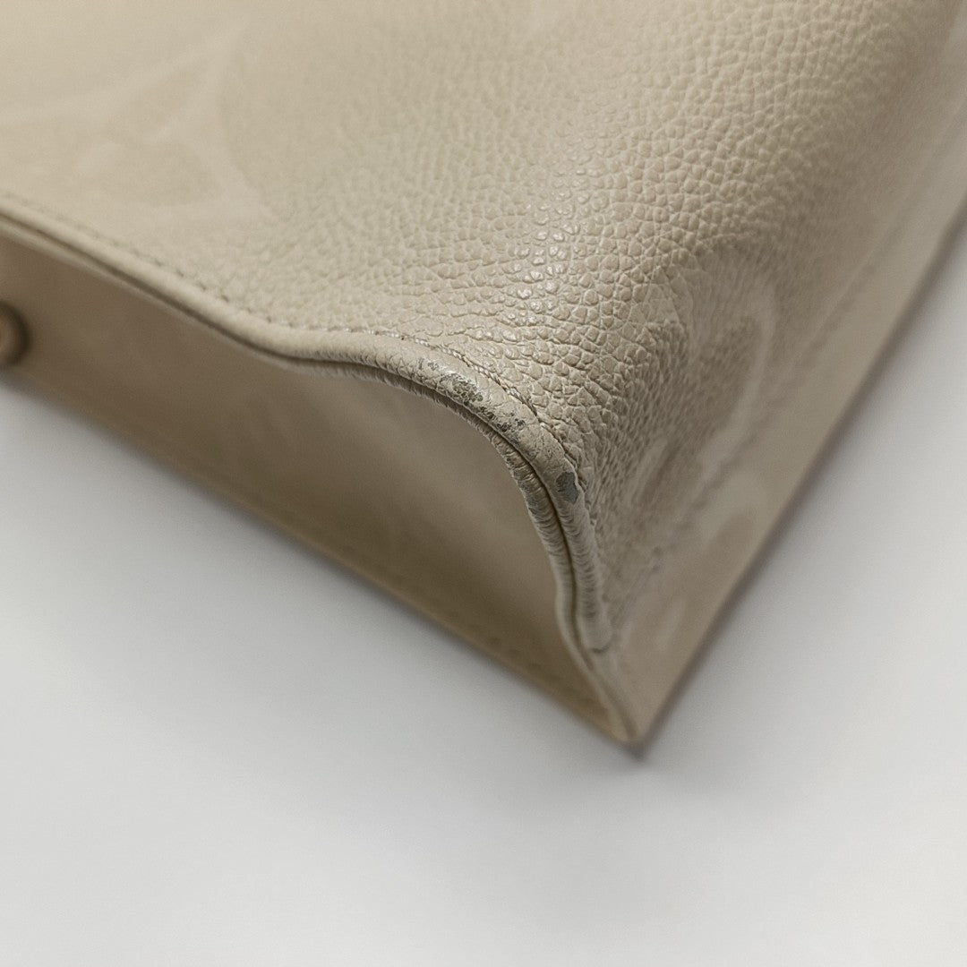 ONTHEGO PM Monogram Calfskin Beige