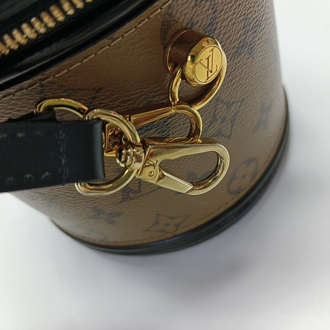 CANNES PM Monogram Coated Canvas Brown