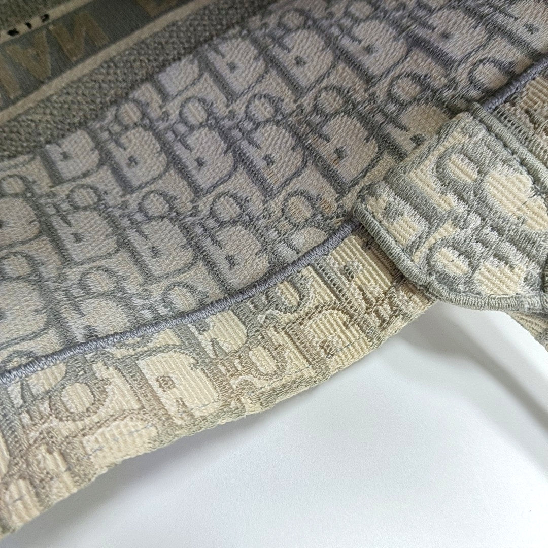 Authenticated pre-owned  Book Tote Large Monogram Canvas Grey - Tote Bag at Looply
