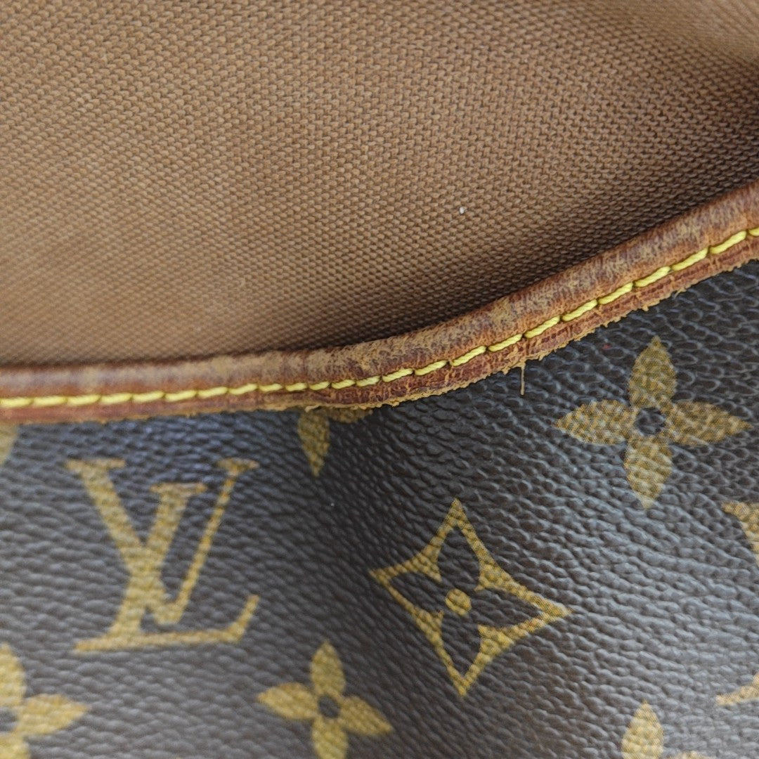 SAUMUR Monogram Coated Canvas Brown