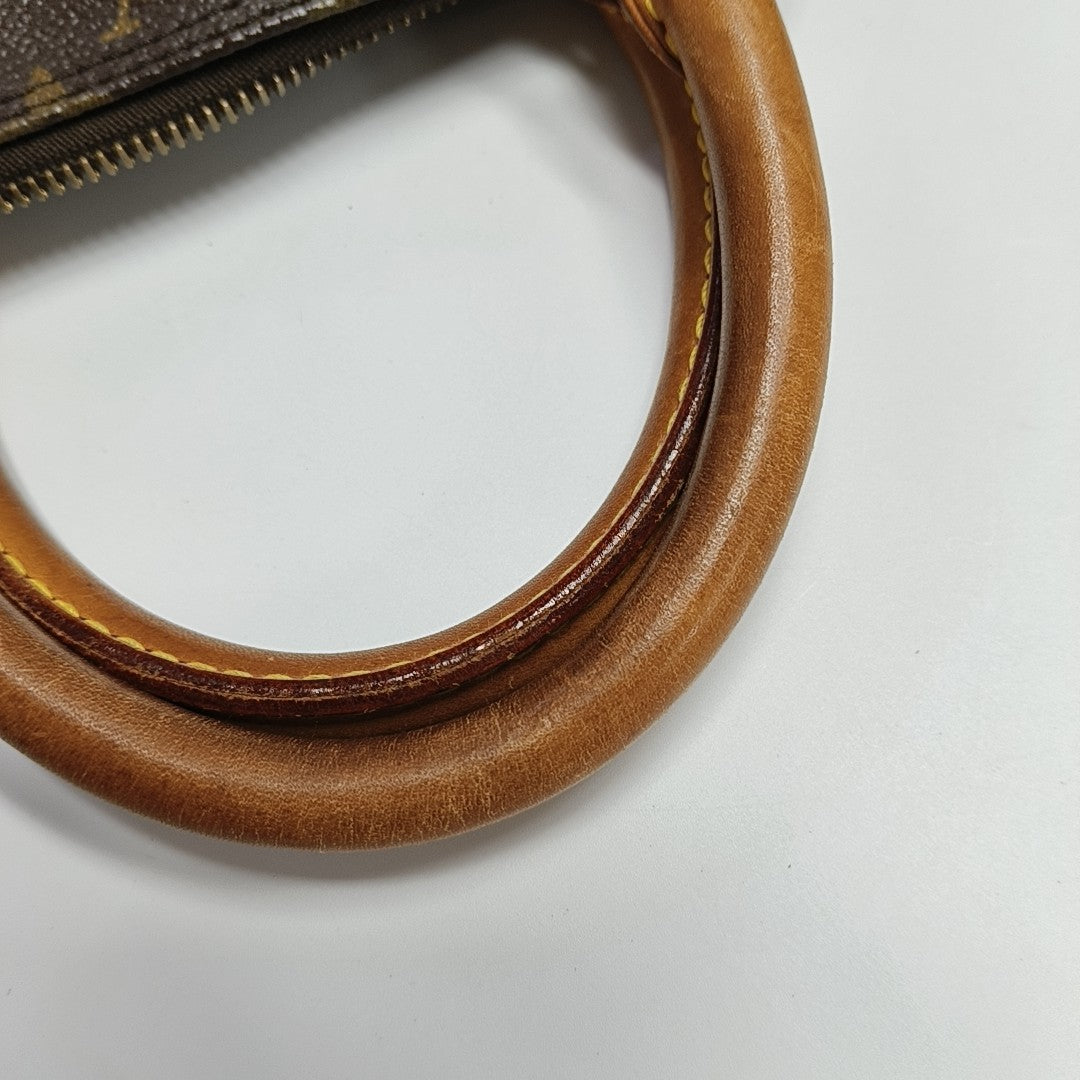 ALMA PM Monogram Coated Canvas Brown