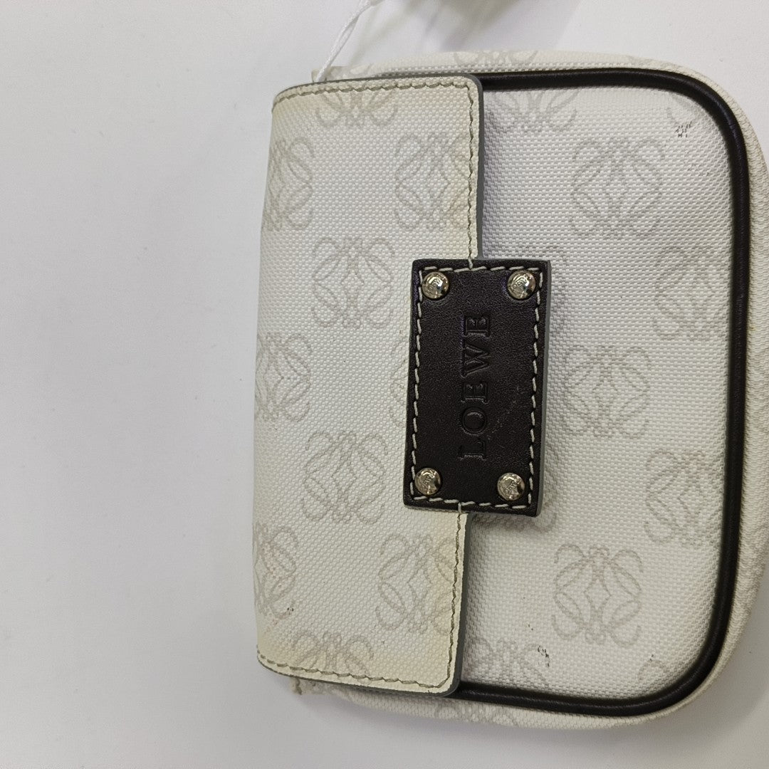 Monogram Coated Canvas Clutch White