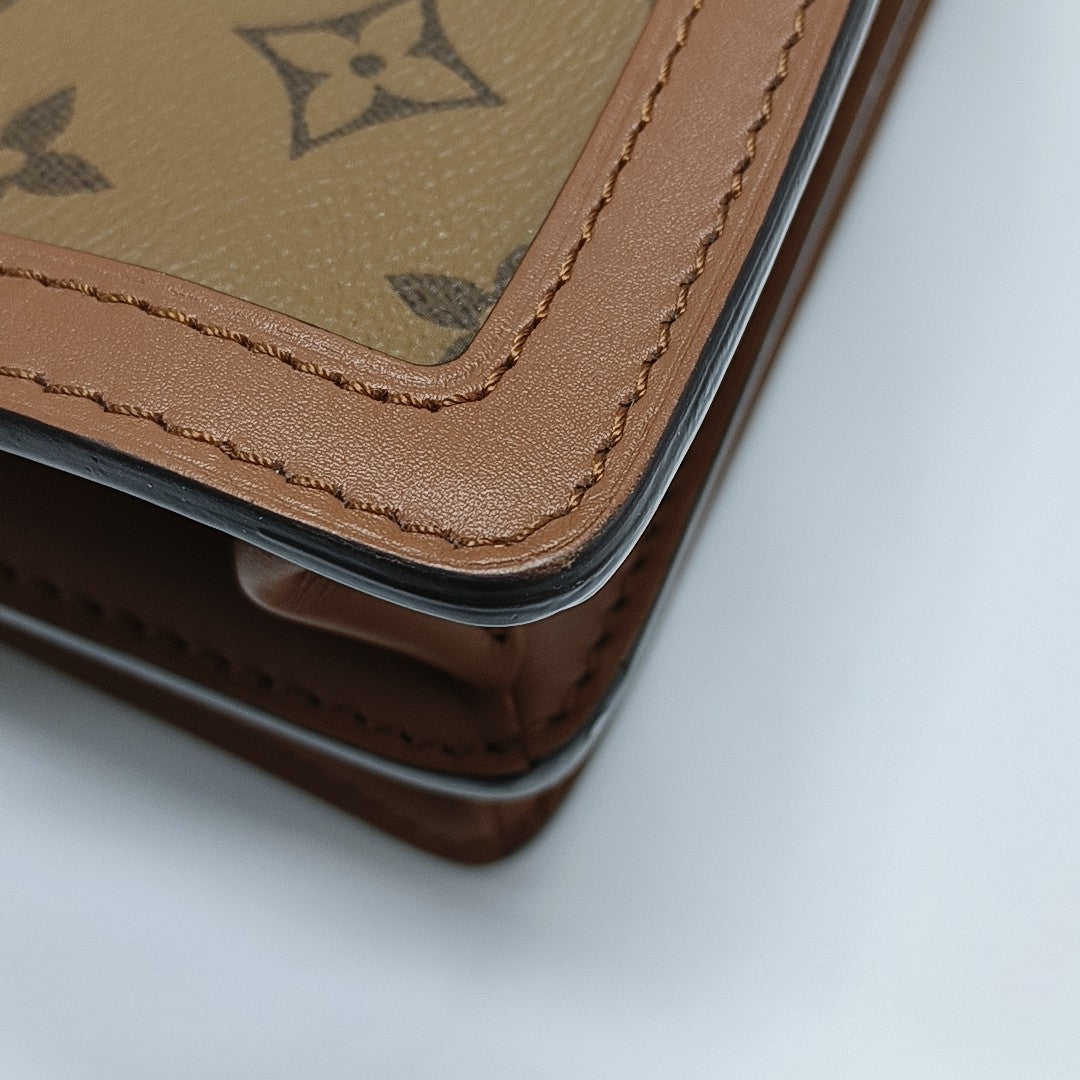 DAUPHINE MM Monogram Coated Canvas Brown