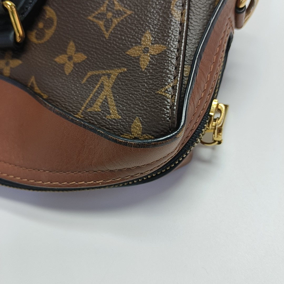 TUILERIES Monogram Coated Canvas Brown