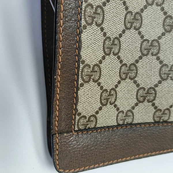 Monogram Coated Canvas Clutch Beige