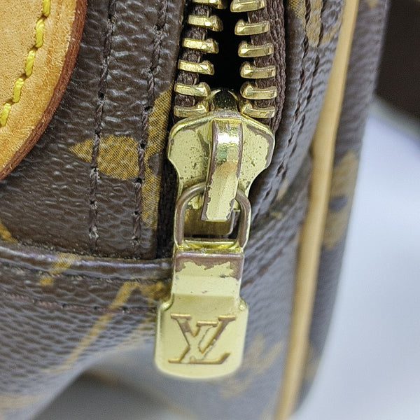 REPORTER PM Monogram Coated Canvas Brown