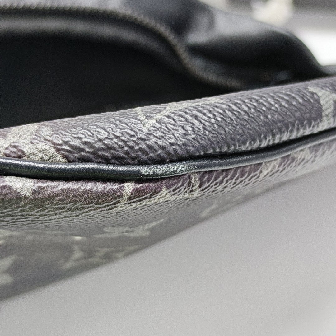 DISCOVERY Monogram Coated Canvas Black