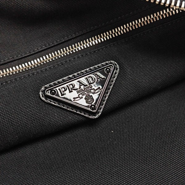 Authenticated pre-owned  Triangle Canvas Black - Shoulder Bag at Looply