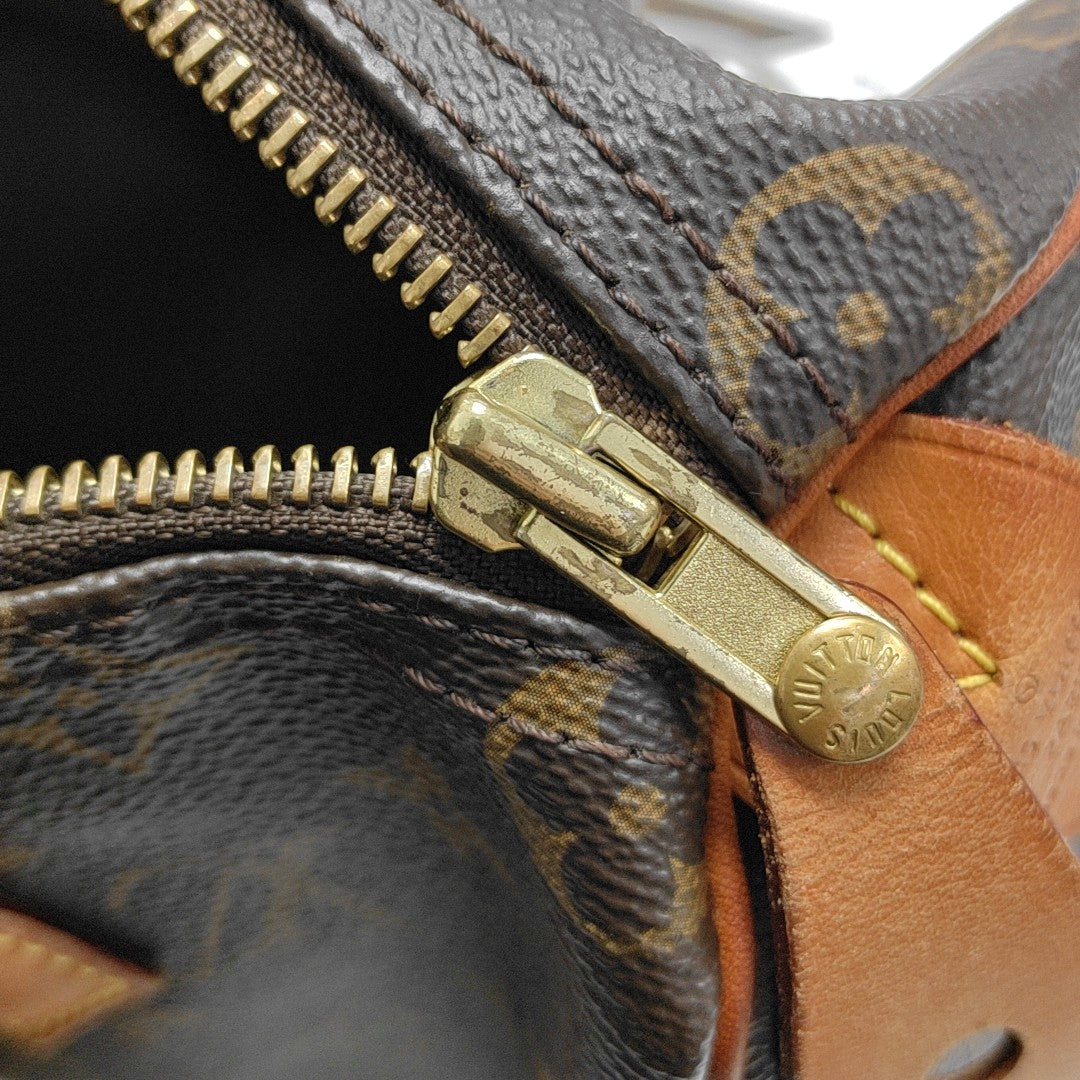 SPEEDY 25 Monogram Coated Canvas Brown