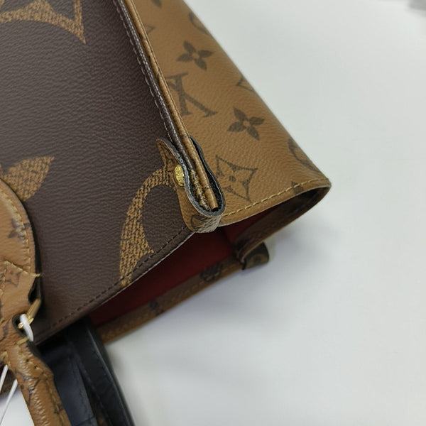 ONTHEGO MM Monogram Coated Canvas Brown