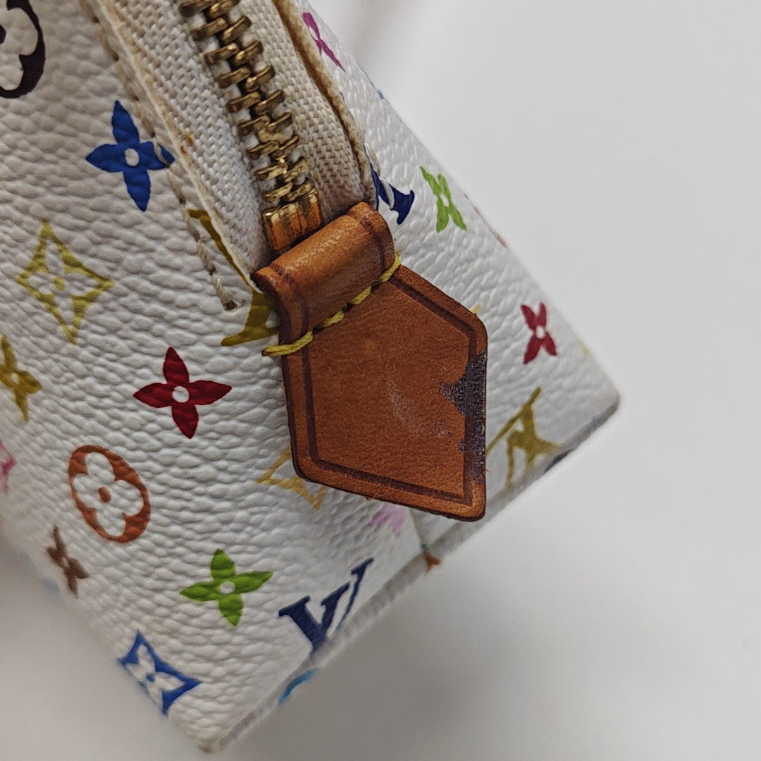 LV × TM COSMETIC PM Monogram Coated Canvas White