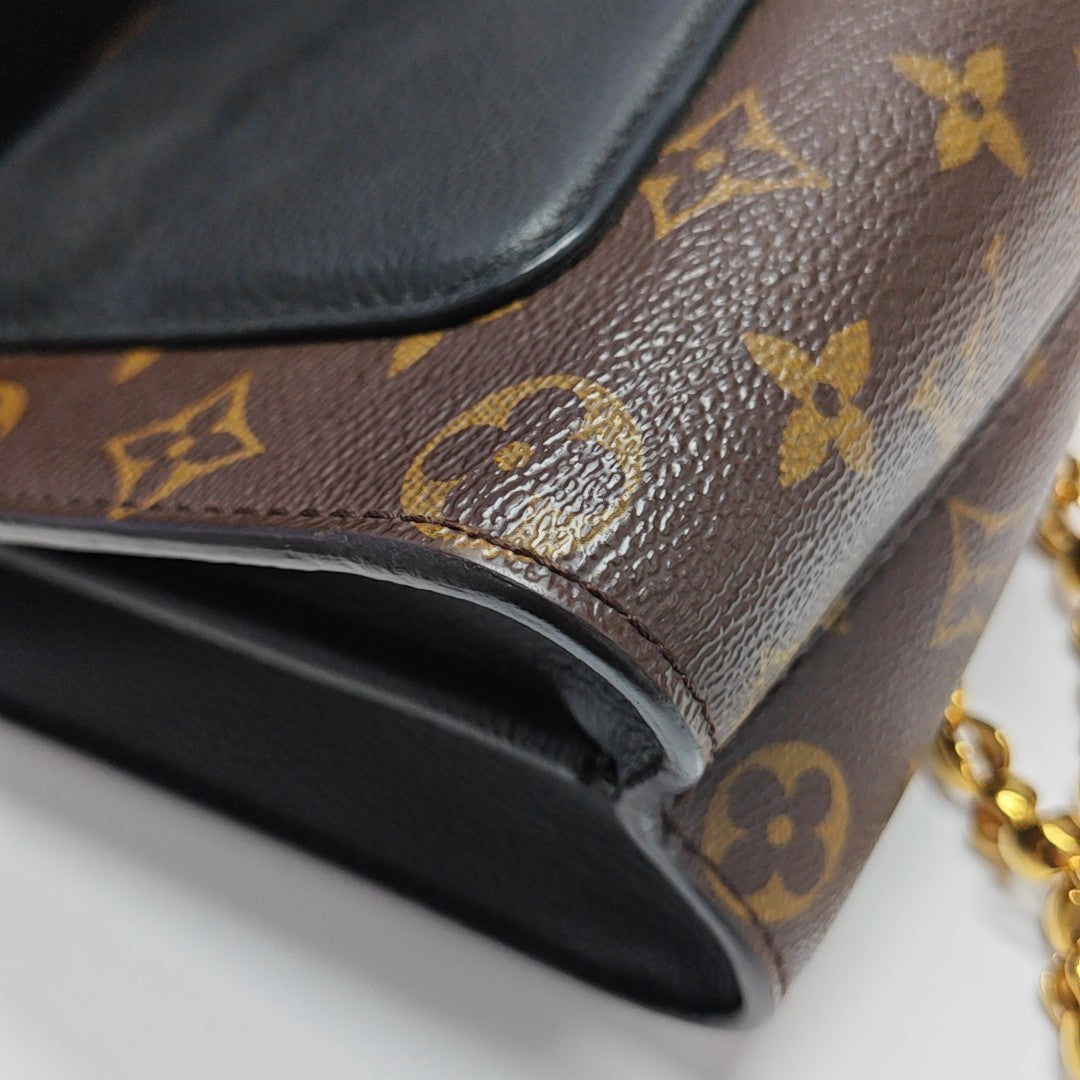 VICTOIRE Monogram Coated Canvas Brown