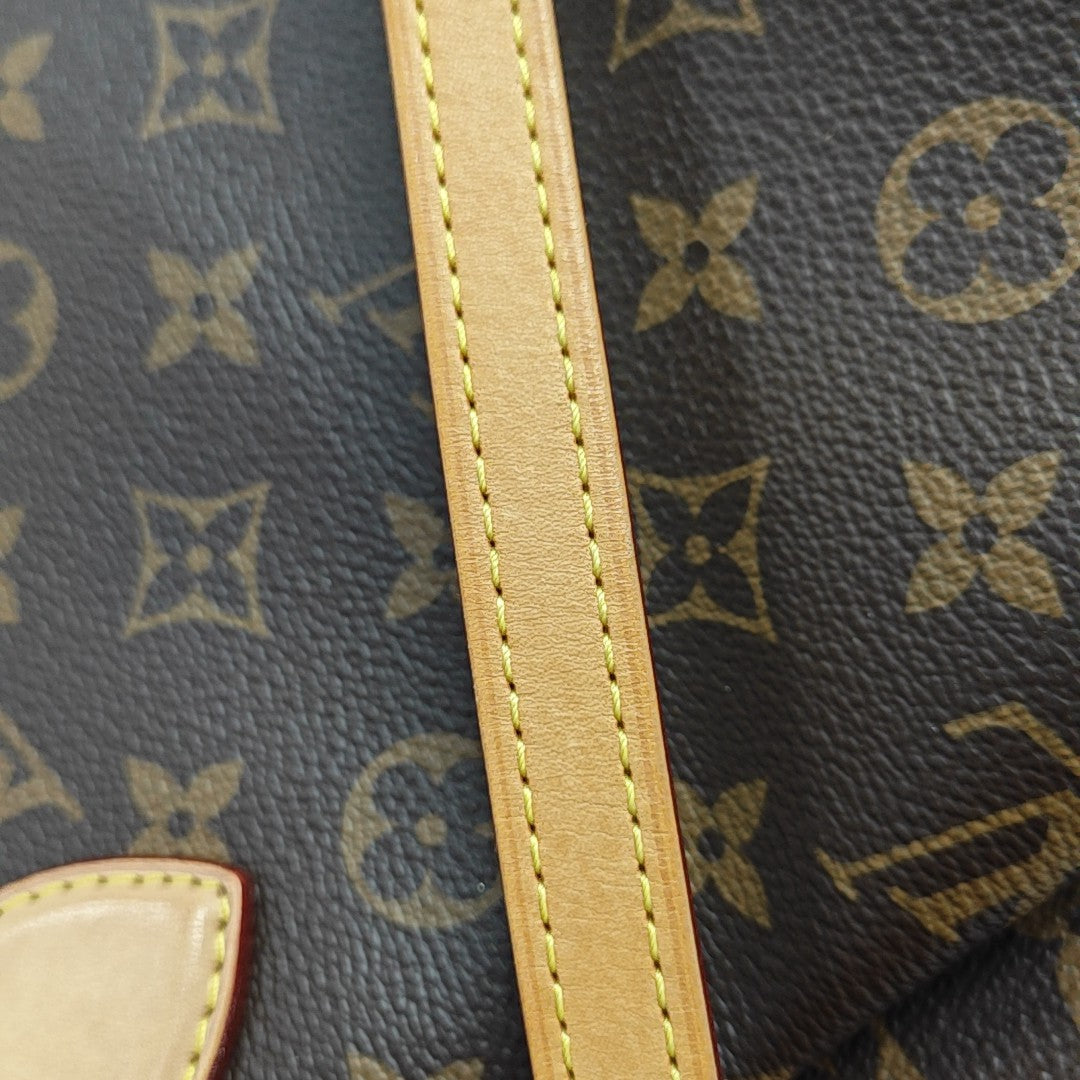 RIVOLI MM Monogram Coated Canvas Brown