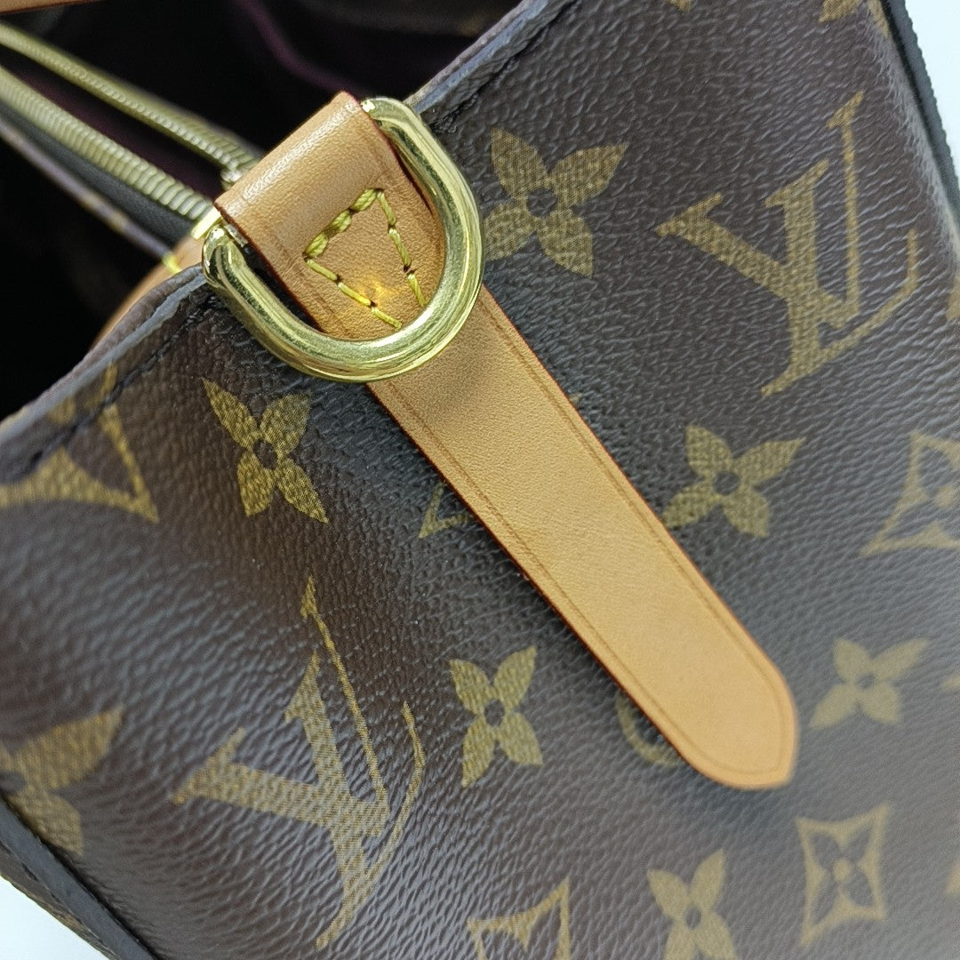 MONTAIGNE Monogram Coated Canvas Brown
