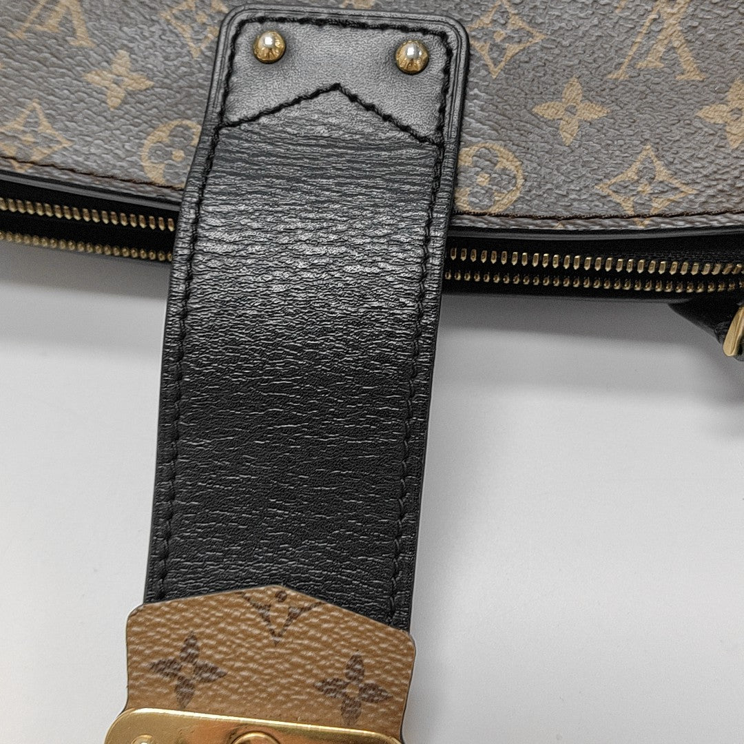 TRUNK Monogram Coated Canvas Brown