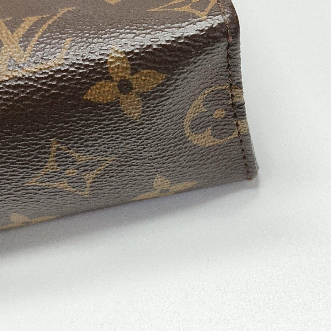 TOILET POCKET 26 Monogram Coated Canvas Brown