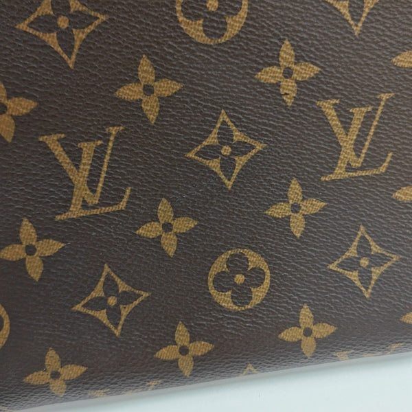DISCOVERY GM Monogram Coated Canvas Brown