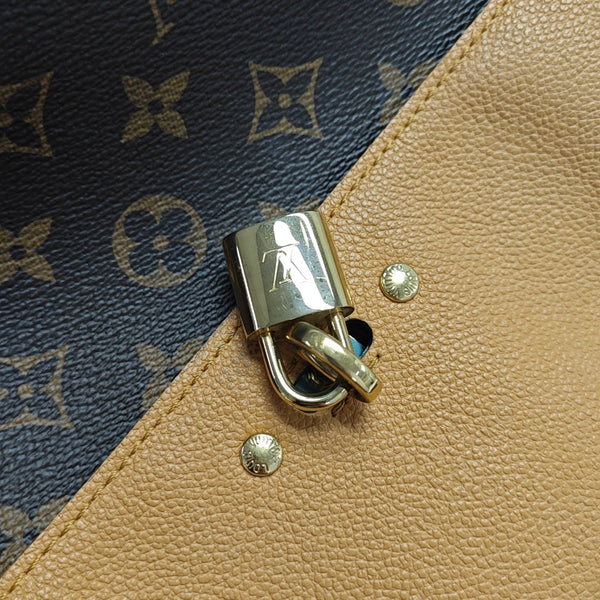 VÉNUS Monogram Coated Canvas Brown