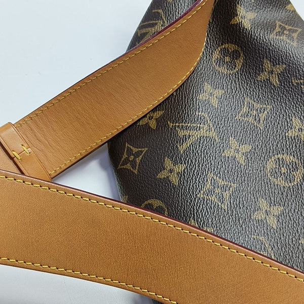 RUSH Monogram Coated Canvas Brown