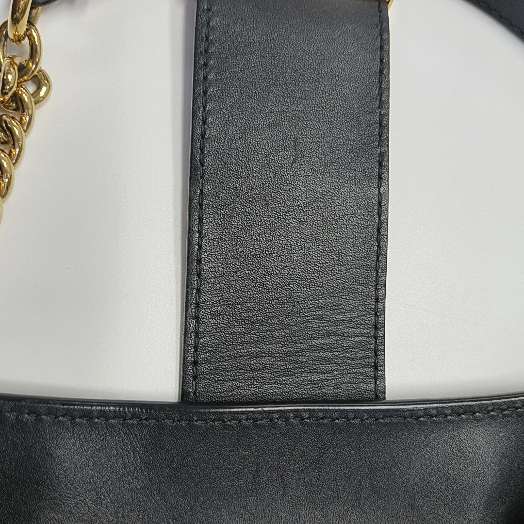Padlock Medium Monogram Coated Canvas Brown