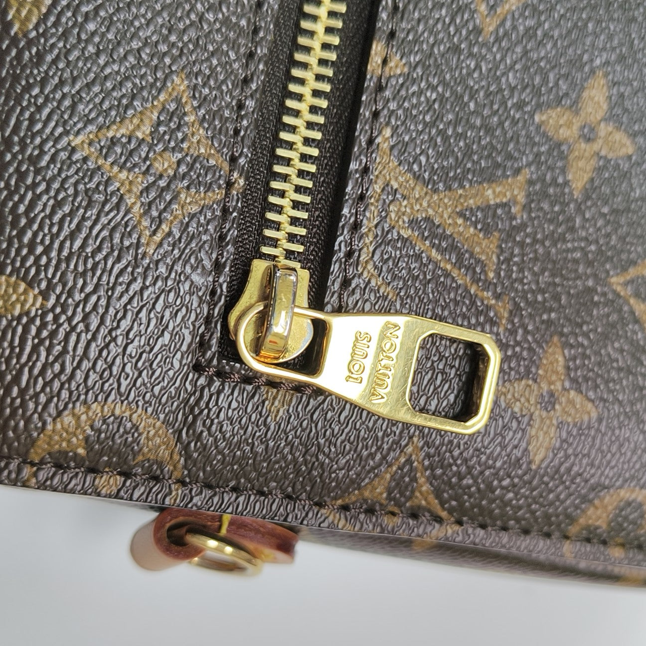 MÉTIS MM Monogram Coated Canvas Brown