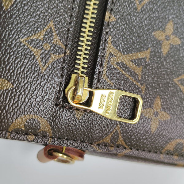 MÉTIS MM Monogram Coated Canvas Brown