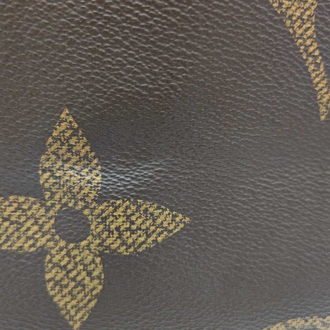 ONTHEGO MM Monogram Coated Canvas Brown